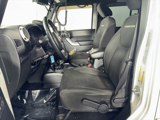used 2015 Jeep Wrangler Unlimited car, priced at $18,729