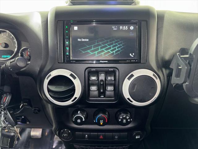 used 2015 Jeep Wrangler Unlimited car, priced at $18,729