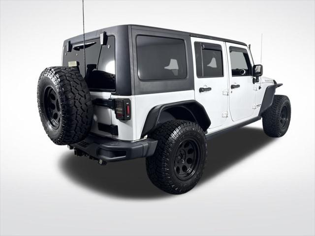 used 2015 Jeep Wrangler Unlimited car, priced at $18,729