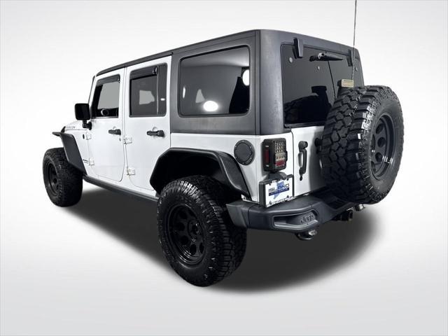 used 2015 Jeep Wrangler Unlimited car, priced at $18,729