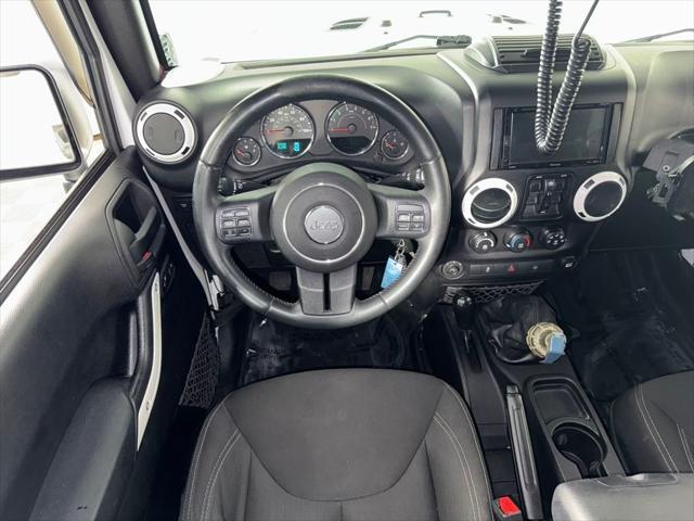 used 2015 Jeep Wrangler Unlimited car, priced at $18,729