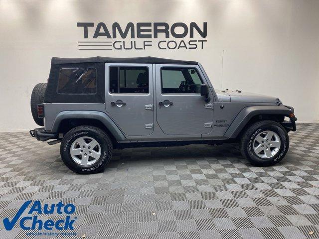 used 2013 Jeep Wrangler Unlimited car, priced at $16,499
