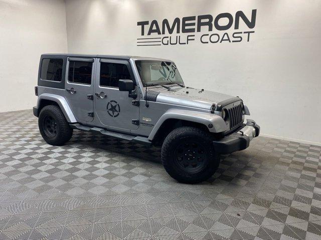 used 2013 Jeep Wrangler Unlimited car, priced at $18,642