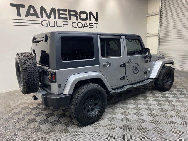 used 2013 Jeep Wrangler Unlimited car, priced at $18,642