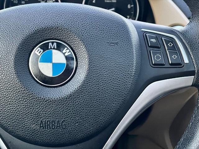 used 2014 BMW X1 car, priced at $8,990