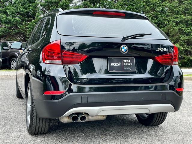 used 2013 BMW X1 car, priced at $9,690