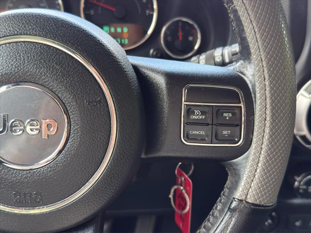 used 2014 Jeep Wrangler Unlimited car, priced at $18,990