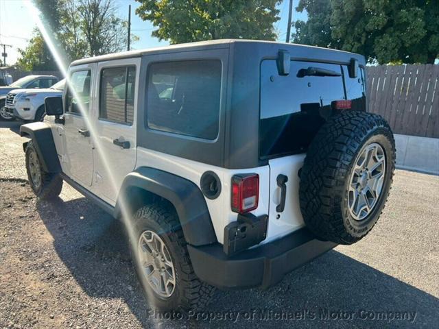 used 2015 Jeep Wrangler Unlimited car, priced at $21,977