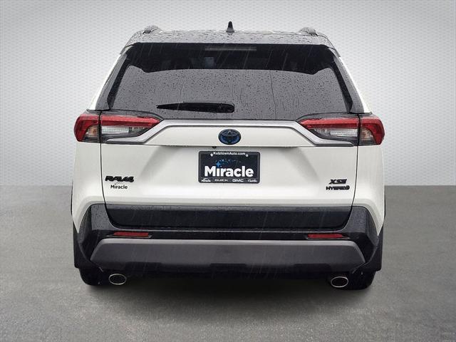 used 2021 Toyota RAV4 Hybrid car, priced at $27,490