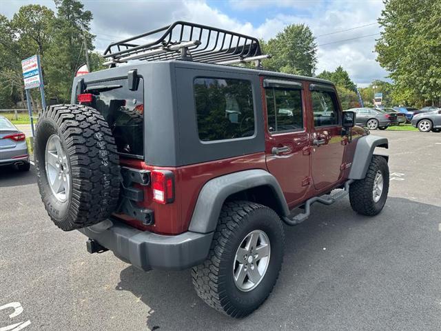 used 2010 Jeep Wrangler Unlimited car, priced at $12,995