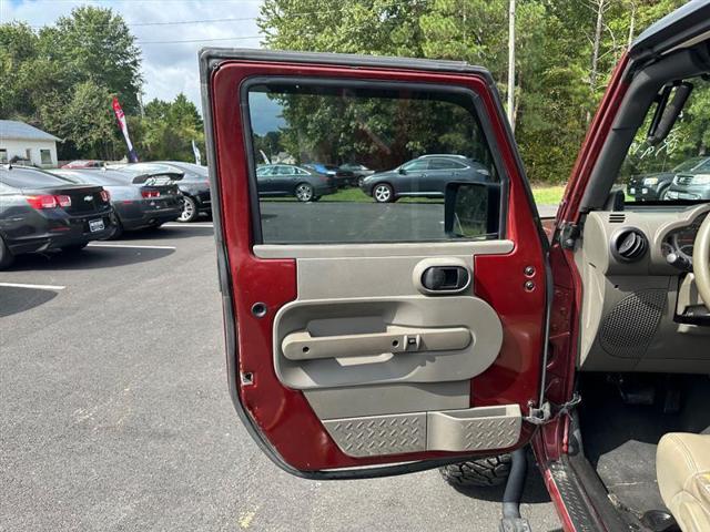 used 2010 Jeep Wrangler Unlimited car, priced at $12,995