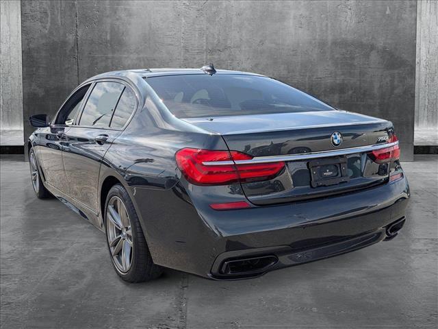 used 2016 BMW 750 car, priced at $26,990