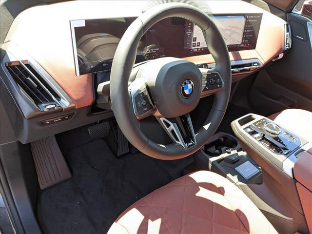 new 2025 BMW iX car, priced at $104,595