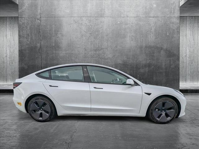 used 2022 Tesla Model 3 car, priced at $27,487