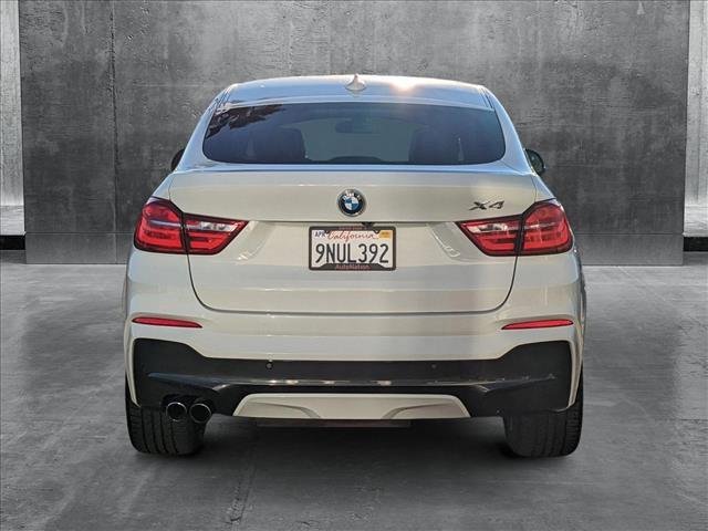 used 2016 BMW X4 car, priced at $19,981