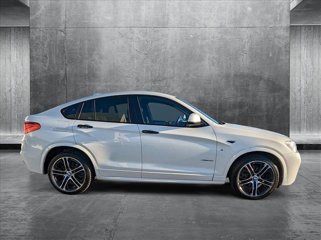 used 2016 BMW X4 car, priced at $19,981