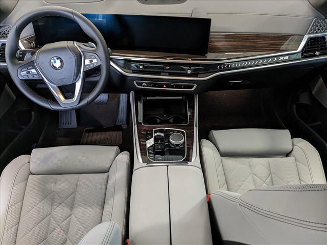 used 2025 BMW X5 car, priced at $73,305