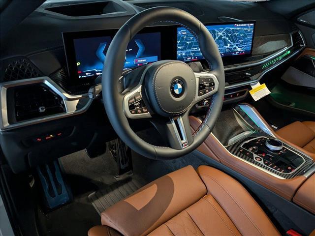 new 2025 BMW X6 car, priced at $107,210