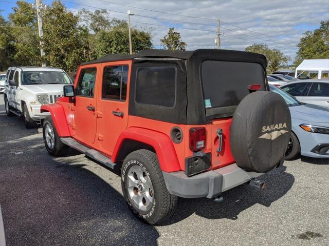 used 2013 Jeep Wrangler Unlimited car, priced at $15,881