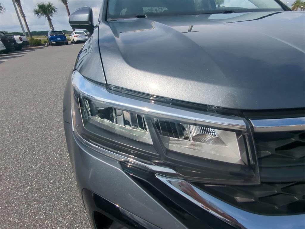 used 2023 Volkswagen Taos car, priced at $21,213