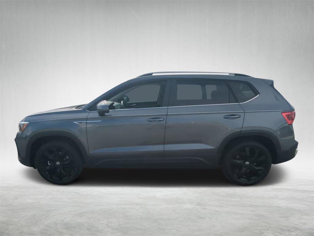used 2023 Volkswagen Taos car, priced at $21,213