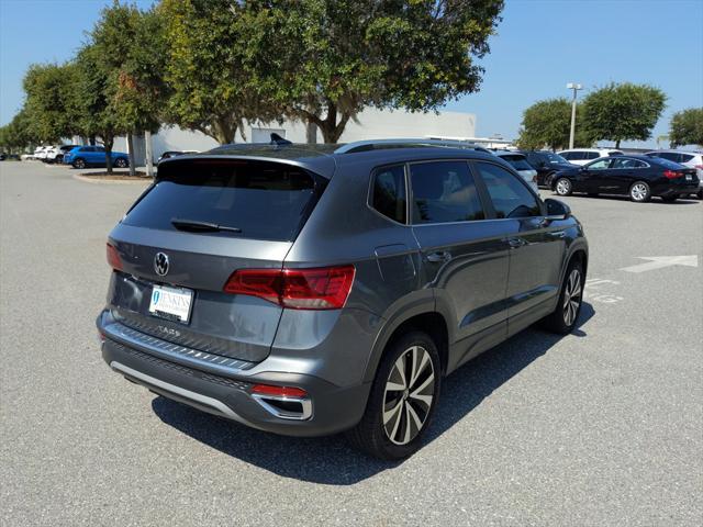 used 2023 Volkswagen Taos car, priced at $22,421