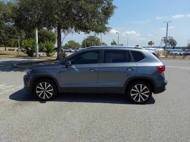 used 2023 Volkswagen Taos car, priced at $22,421