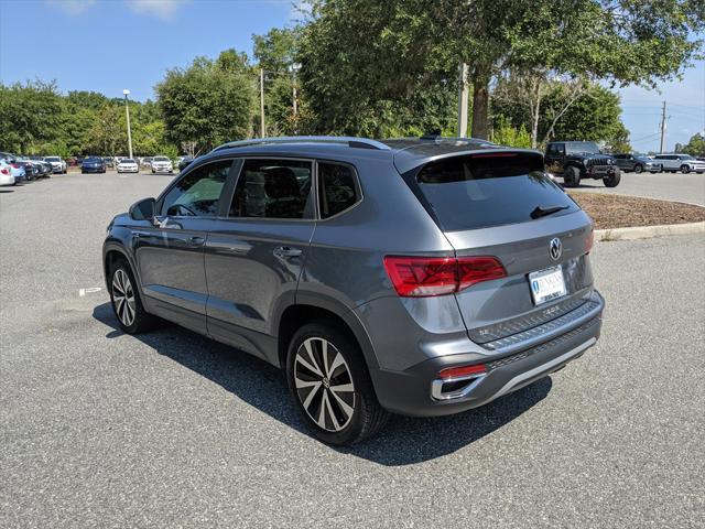 used 2023 Volkswagen Taos car, priced at $22,421