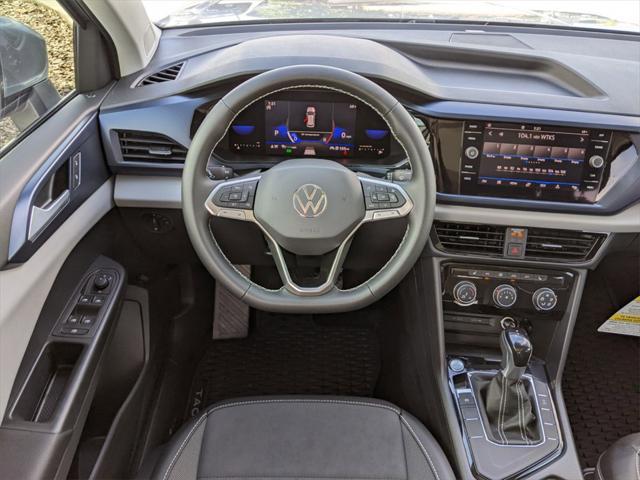 used 2023 Volkswagen Taos car, priced at $29,696