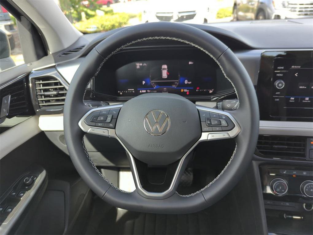 new 2025 Volkswagen Taos car, priced at $27,948