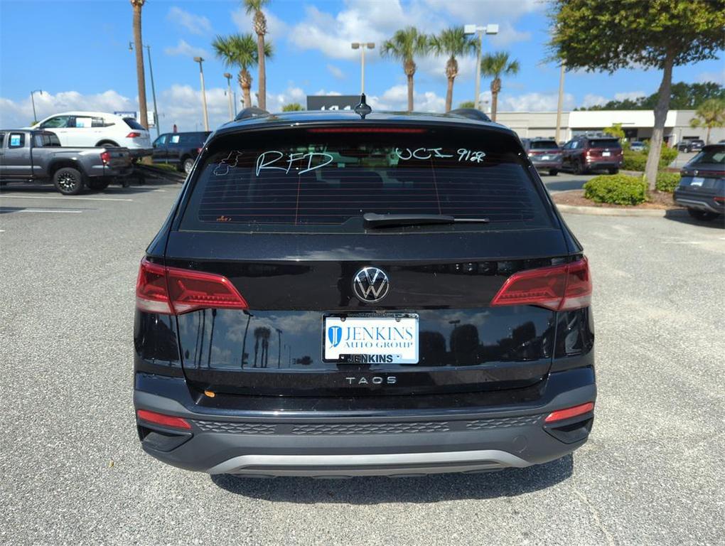 used 2023 Volkswagen Taos car, priced at $21,007