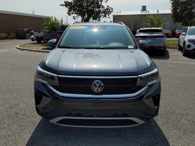 used 2023 Volkswagen Taos car, priced at $22,061