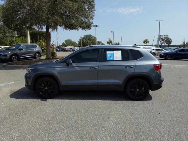 used 2023 Volkswagen Taos car, priced at $22,061