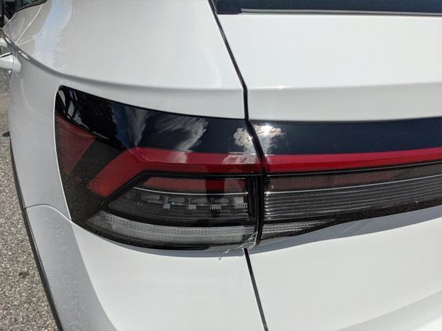new 2025 Volkswagen Taos car, priced at $25,864