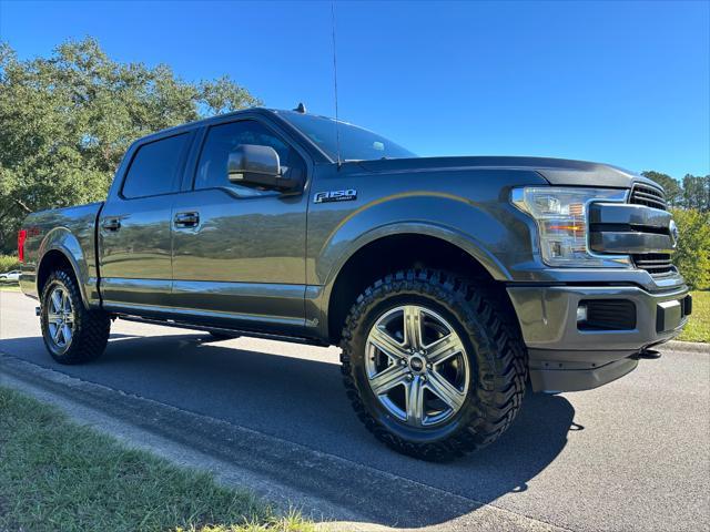 used 2018 Ford F-150 car, priced at $34,900