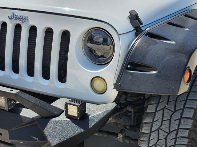 used 2016 Jeep Wrangler Unlimited car, priced at $16,833