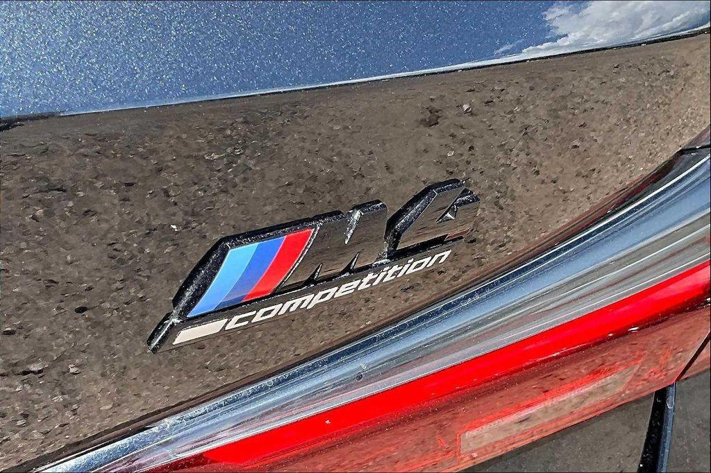 used 2022 BMW M4 car, priced at $67,000