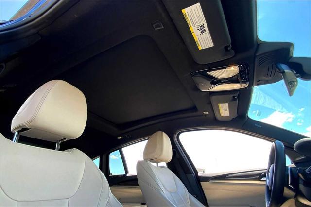 used 2022 BMW X4 car, priced at $52,000