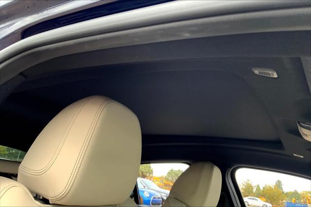 used 2022 BMW X4 car, priced at $52,000