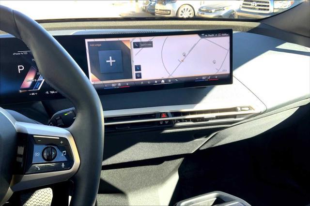 used 2024 BMW iX car, priced at $69,500