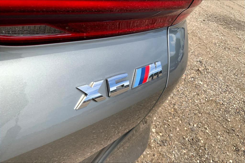 used 2021 BMW X6 M car, priced at $85,000