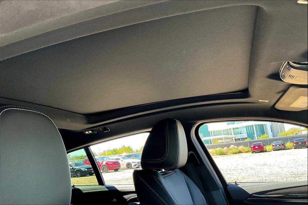 used 2023 BMW X4 car, priced at $54,950