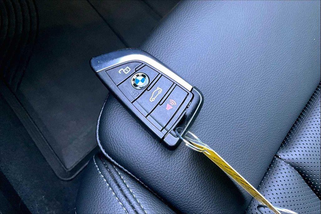 used 2023 BMW X4 car, priced at $54,950