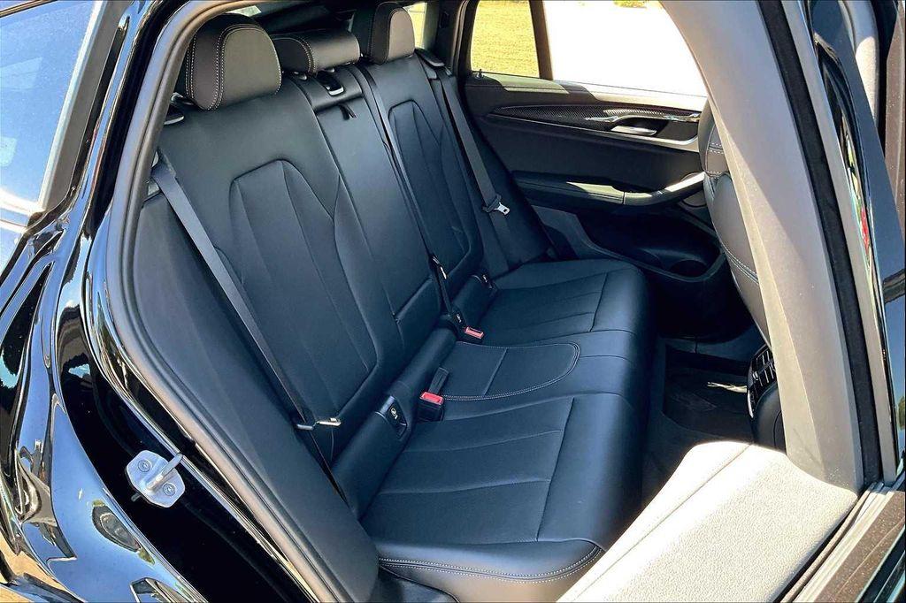 used 2023 BMW X4 car, priced at $54,950