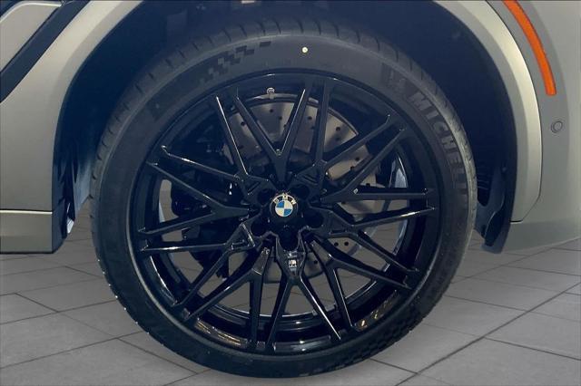 new 2025 BMW X6 M car, priced at $149,700