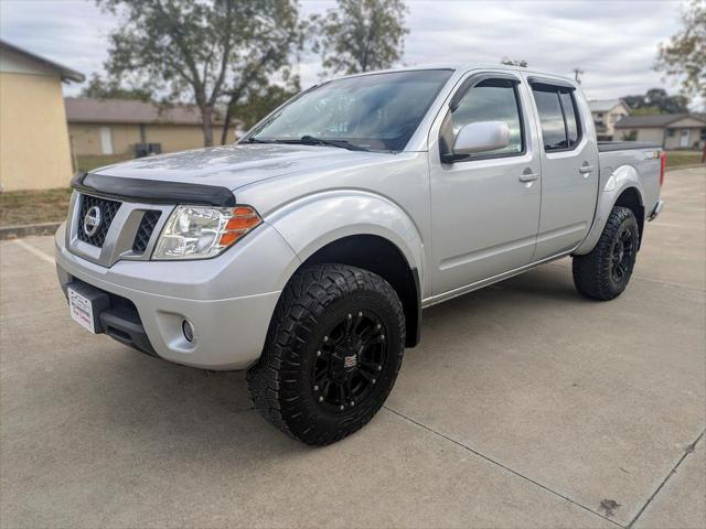 used 2013 Nissan Frontier car, priced at $14,995