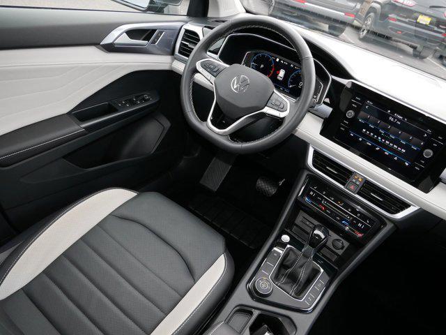 used 2025 Volkswagen Taos car, priced at $30,975