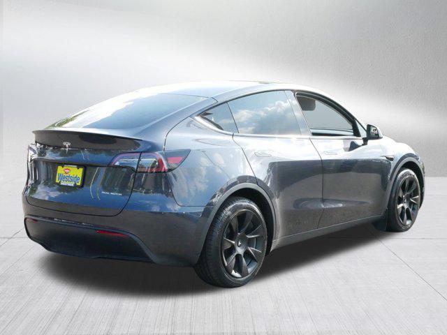 used 2024 Tesla Model Y car, priced at $34,975