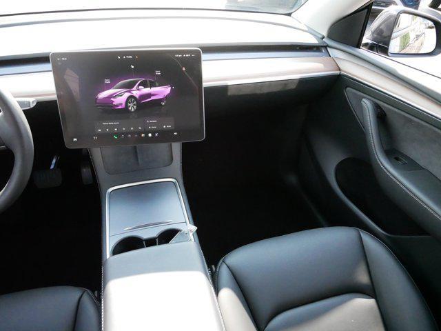 used 2024 Tesla Model Y car, priced at $34,975