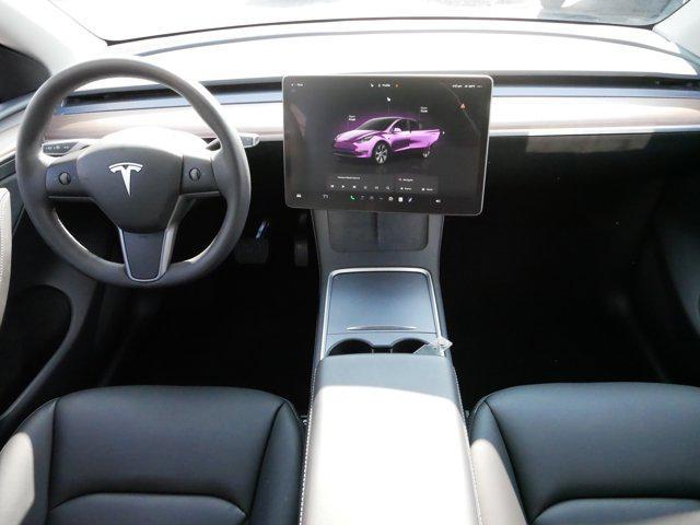 used 2024 Tesla Model Y car, priced at $34,975
